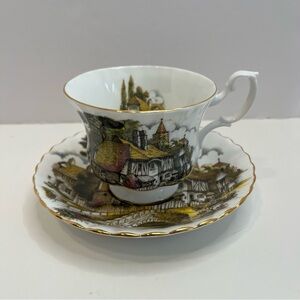 ROYAL ALBERT footed tea cup and saucer bone china England cottage print